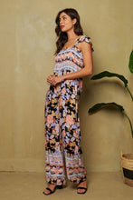 Load image into Gallery viewer, FLORAL BORDER SMOCKED BODICE RUFFLED JUMPSUIT: S / Black
