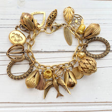 Load image into Gallery viewer, Vintage Inspired Gilded Charm Bracelet
