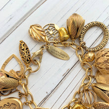 Load image into Gallery viewer, Vintage Inspired Gilded Charm Bracelet
