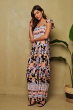 Load image into Gallery viewer, FLORAL BORDER SMOCKED BODICE RUFFLED JUMPSUIT: L / Black
